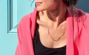LIQUID Bar Necklace in 14K gold fill, worn by model in pink