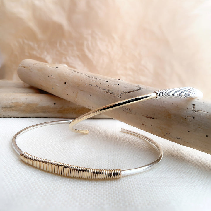 HELIX two-tone faceted cuff bracelet in both 14K gold fill and sterling silver with contrasting wire wrap